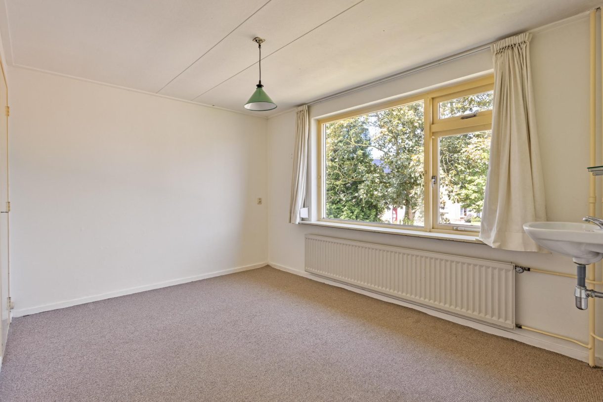 Te koop: Foto Woonhuis aan de Zandsedwarsstraat 8 in Huissen